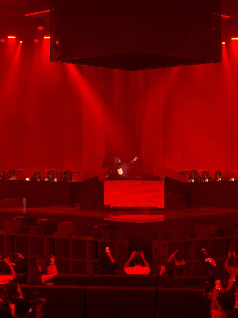 The BMIC 2026 stage washed in red light