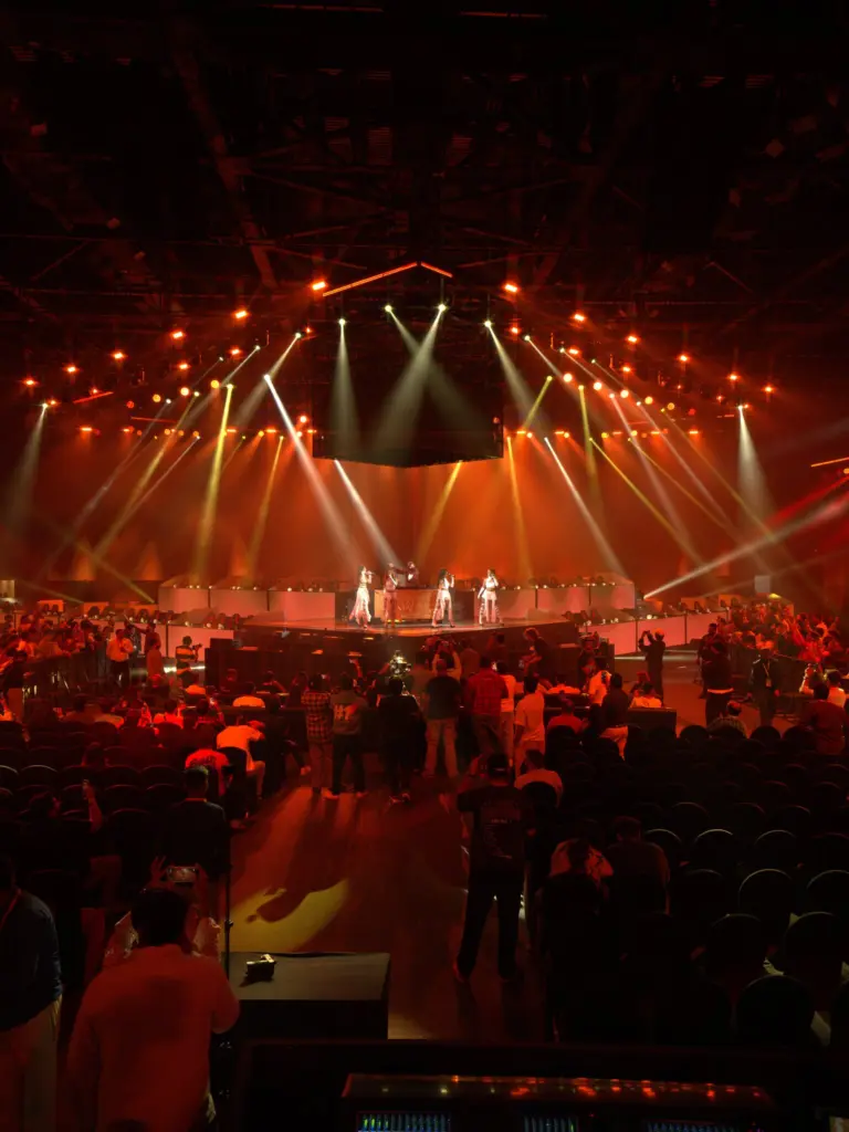 Stage lights over the crowd at the NSCI Dome during the BMIC 2026 opening