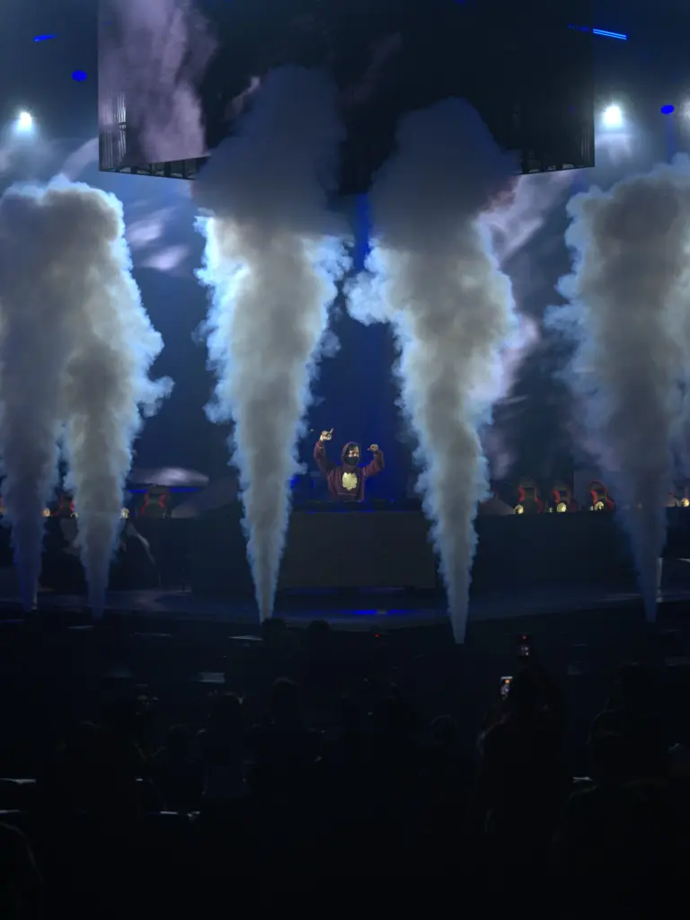 Smoke jets fire across the stage during Alan Walker's set at BMIC 2026