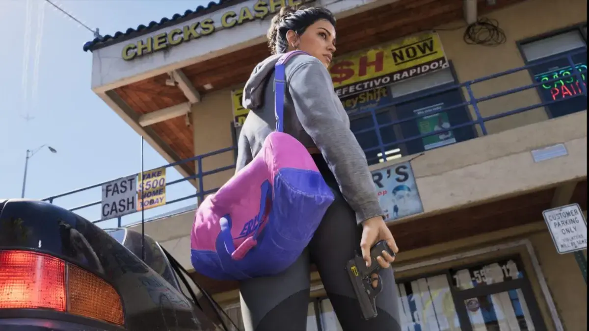 Official GTA 6 screenshot of Lucia carrying a duffel bag and a pistol outside a check cashing store in Leonida.