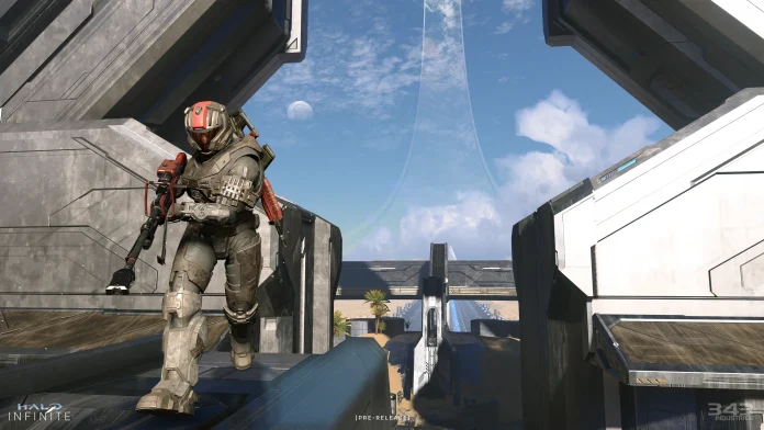 Screenshot of a Halo Infinite multiplayer match with multiple Spartans in combat.