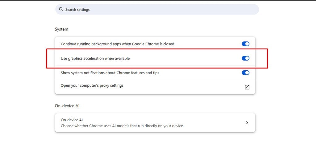 Google Chrome System settings showing the “Use graphics acceleration when available” option enabled and highlighted with a red box.