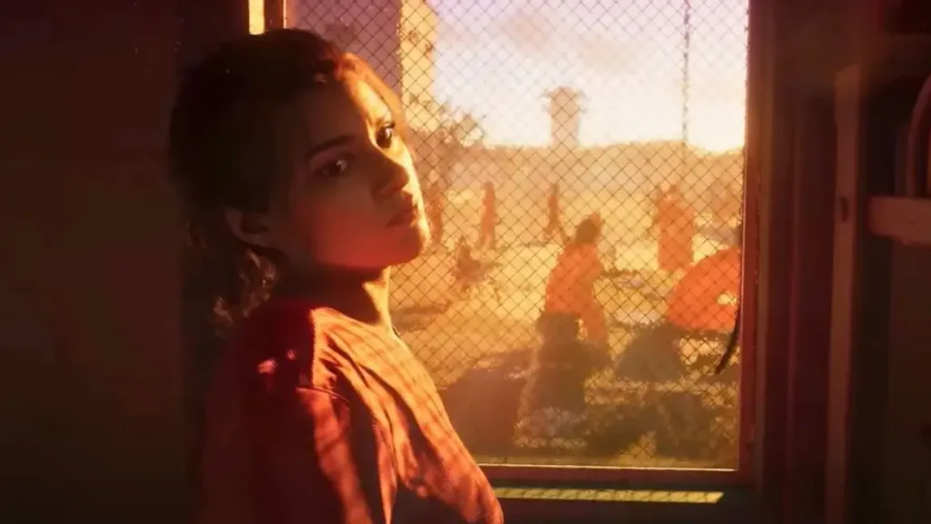 Lucia looks back from inside a prison transport vehicle, illuminated by warm sunset light with a fenced prison yard visible in the background.