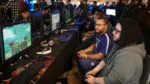 Players competing at an esports tournament with digital rewards on offer