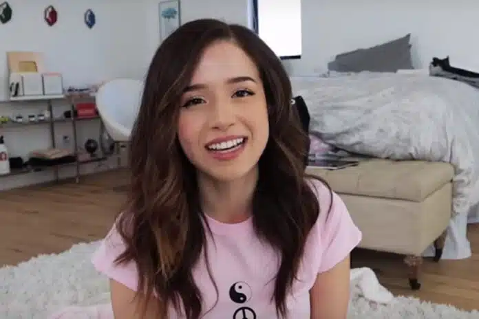 Image of streamer Pokimane during her podcast, discussing her decision to leave Twitch and her commitment to fostering a more inclusive and positive streaming community